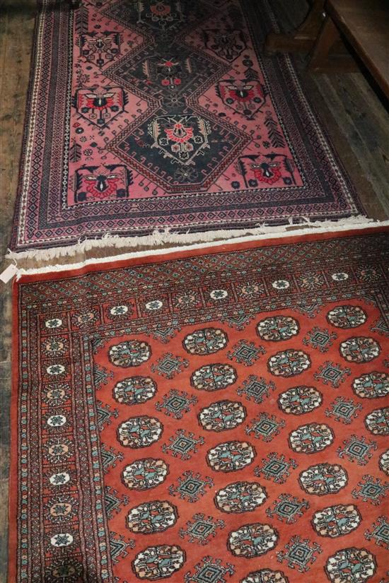 Bokhara orange ground rug & Persian pink ground rug(-)